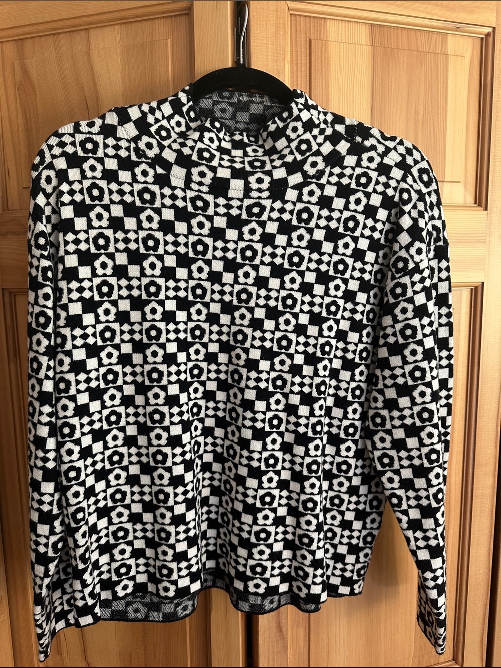 Maeve knit black and white geometric pattern cowl turtleneck from Anthropologie